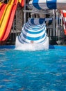 Vertical image of happy family in water splash Royalty Free Stock Photo