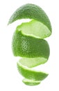 Vertical image of lime fruit peel over white background.