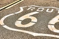 Vertical image of route 66 road leading towards the distant horizon Royalty Free Stock Photo