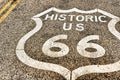Vertical image of route 66 road leading towards the distant horizon Royalty Free Stock Photo