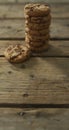 Vertical image of stack of chocolate chip cookies on wooden background Royalty Free Stock Photo