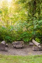 Relaxation area made out of wood inside the forest Royalty Free Stock Photo