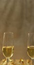 Vertical image of two glasses of champagne making a toast Royalty Free Stock Photo