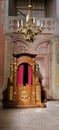 Vertical inside view of Bernardine monastery with an old wooden confessional, vintage architecture