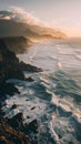 Vertical landscape of ocean beach at sunrise with big waves crashing into rocks Royalty Free Stock Photo