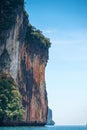 Vertical landscape - view of a high steep cliff in the sea