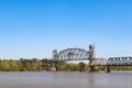 Vertical-lift through truss bridge over the Arkansas River on the Arkansas & Missouri Railroad between Fort Smith and Van Buren in Royalty Free Stock Photo