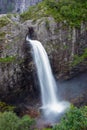 Vertical long exposure shot of the Manafossen waterfall