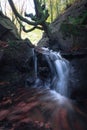 Vertical long exposure of waterfall in the mountain of Gorbea, Spain Royalty Free Stock Photo
