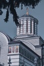 Vertical low angle closeup shot of a dome Catholic church