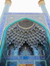 Vertical low angle shot of the beautiful Shah Mosque captured in Isfahan, Iran