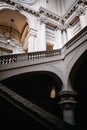 Vertical low angle shot of a building with concrete stairs and beautiful carvings in Roubaix, France Royalty Free Stock Photo