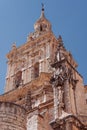 Vertical low-angle shot of the Catedral de Burgo de Osma with a blue sky in the background, Spain Royalty Free Stock Photo