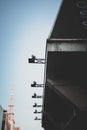 Vertical low angle shot of a corner of a modern building under the blue sky