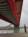 Vertical low angle shot of the Friedrich-Ebert-Bridge under a cloudy sky