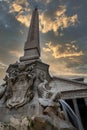 Vertical low angle shot of a historic stone water mountain in Rome, Italy