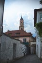 Vertical low angle shot of a historical building in the Arcaded Street in Merano Italy