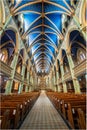 Vertical low angle shot of the interior of Notre Dame Cathedral Basilica in Ottawa, Canada