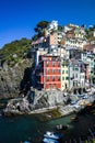 Vertical low angle shot of the Manarola town in Italy - vacation memories