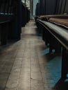 Vertical low angle shot of pews inside a Christian church Royalty Free Stock Photo