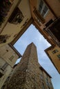 Vertical low angle shot of Torre del Gombito landmark and nearby buildings in Bergamo, Italy Royalty Free Stock Photo