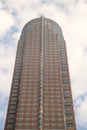 Vertical low-angle shot of the Trade Fair Tower in the finance district of Frankfurt, Germany