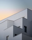 Vertical low angle shot of a white concrete building captured in Massy, France Royalty Free Stock Photo