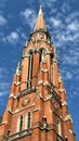 Vertical low-angle view of the Cathedral of St. Peter and St. Paul tower against the blue sky