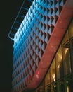 Vertical low-angle view of the facade wall of the Hoog Catharijne at night in Utrecht Royalty Free Stock Photo