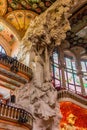 Vertical low-angle view from the theatre balconies interior of Palau de la Musica in Barcelona