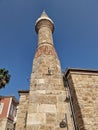 Vertical low-angle view of Yivliminare Mosque against the blue sky Royalty Free Stock Photo