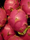 Vertical macro shot of a few pitahaya stocked together - perfect for background Royalty Free Stock Photo