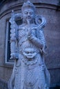 Vertical of a marble statue of Buddha in New York