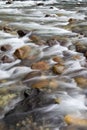 Vertical of Middle Fork Snoqualmie River flowing through rocks Royalty Free Stock Photo