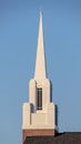 Vertical Modern white church steeple or spire near sunrise Royalty Free Stock Photo