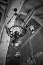 Vertical monochrome shot of a vintage chandelier