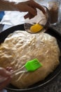 Pastilla preparation covering the dough with butter