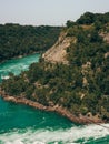 Vertical of Niagara Falls, Ontario, Canada in green mountains