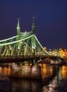 Vertical night view of the Liberty Bridge over Danube river in Budapest, Hungary Royalty Free Stock Photo