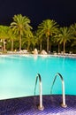 Vertical night view for tropical swimming pool Royalty Free Stock Photo