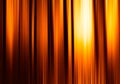 Vertical orange motion blur curtains with glow background