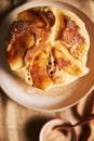 Vertical overhead shot of apple pancakes on a plate with a bowl of brown sugar on the side Royalty Free Stock Photo