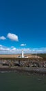 Vertical panorama of the Nash Point Lighthouse and Monknash Coast in South Wales Royalty Free Stock Photo