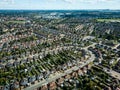 Vertical panoramic aerial view of suburban houses in Ipswich, UK. Orwell river in the background. Nice sunny day.