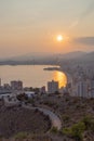 Vertical panoramic sunset view of the Mediterranean Sea and the beach in Benidorm, Spain Royalty Free Stock Photo