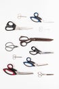 vertical pattern from various scissors on white