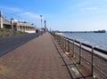 Vertical perspective view along the pedestrian promenade in blackpool with a view of the town tower and pier in the distance Royalty Free Stock Photo