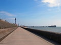 Vertical perspective view along the pedestrian promenade in blackpool with a view of the town tower and pier in the distance Royalty Free Stock Photo