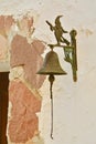 Vertical photo of antique metallic door bell in Trasmoz, Zaragoza, Aragon, Spain. Village officially cursed and excommunicated by