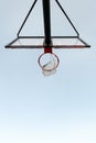 Vertical photo of basketball hoop view from below